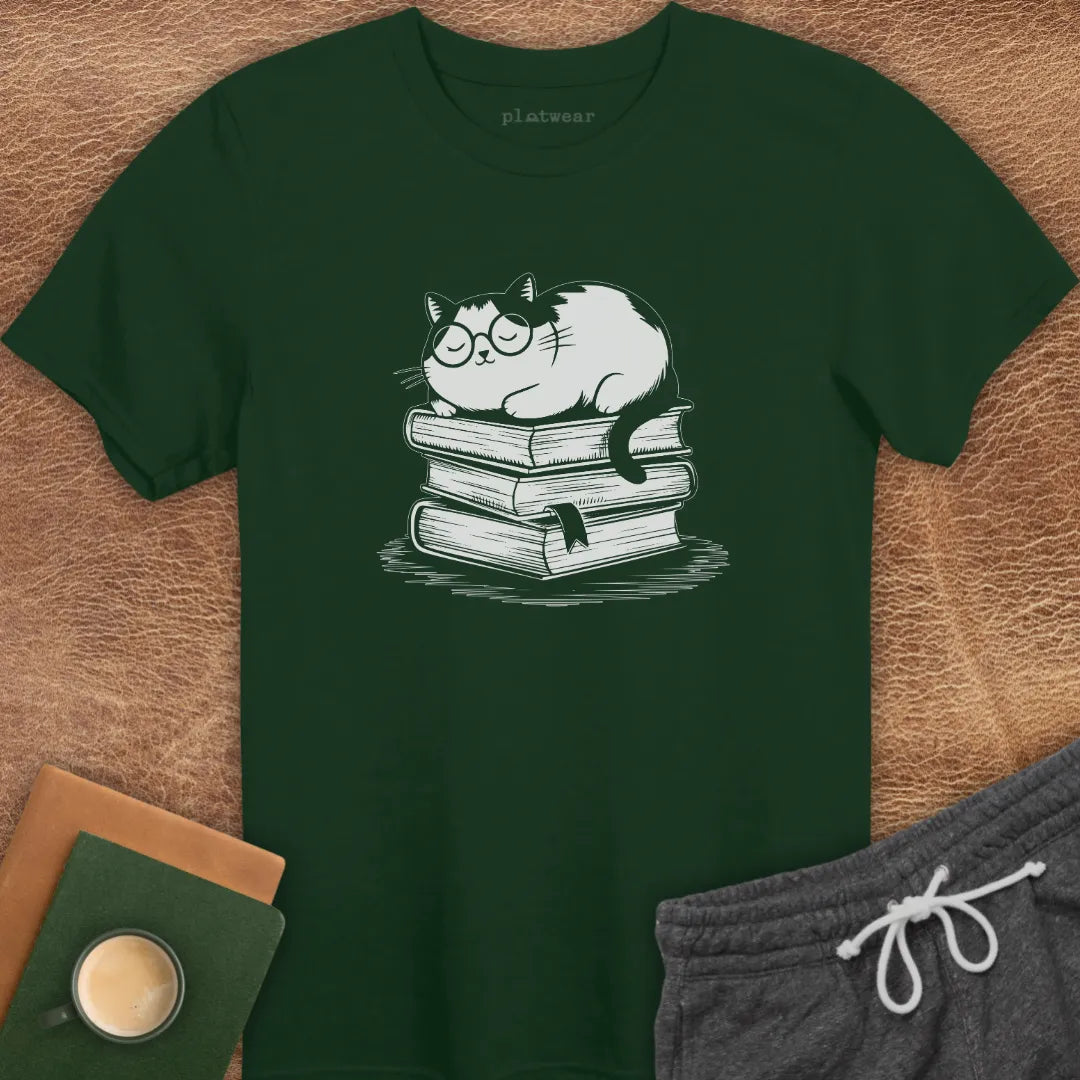 CAT SLEEPING ON BOOKS T-SHIRT